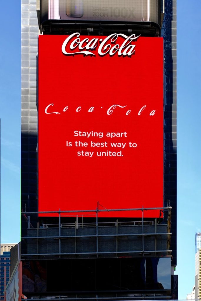 Coca Cola billboard logo letters spaced out - staying apart is the best way to stay united