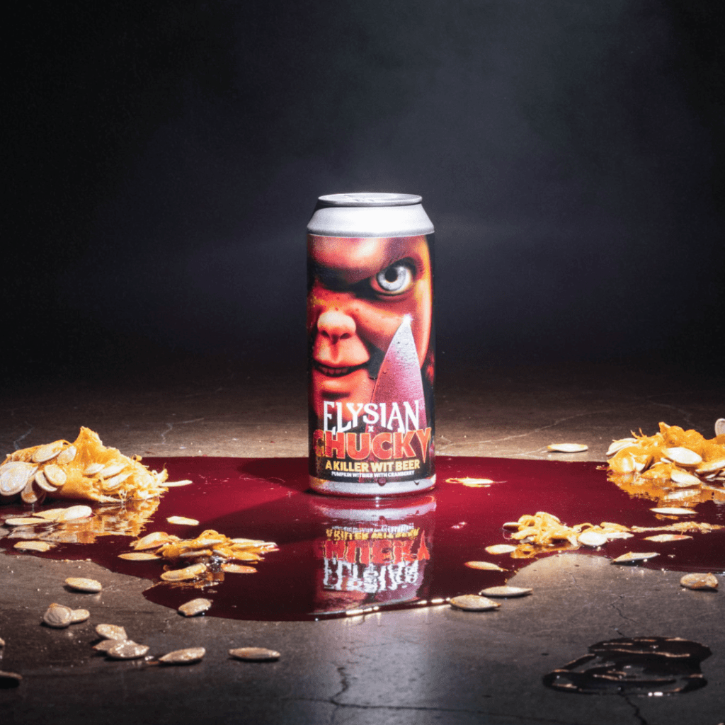 A Killer Wit Beer packaging's label has the oversized, menacing face of Chucky with a blood-soaked blade.