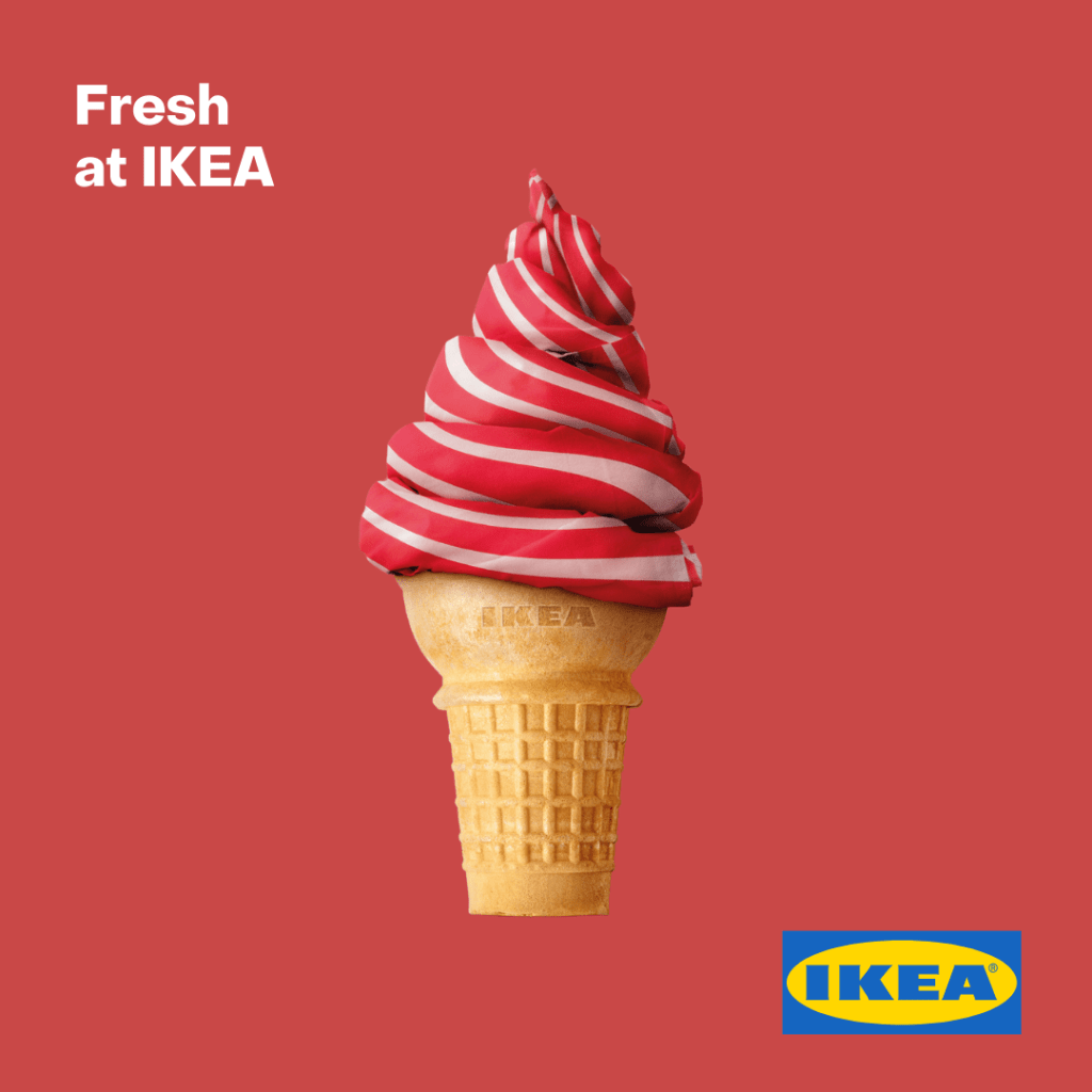 Ikea rose and white spaced quilt folded into the shape of an ice cream cone.