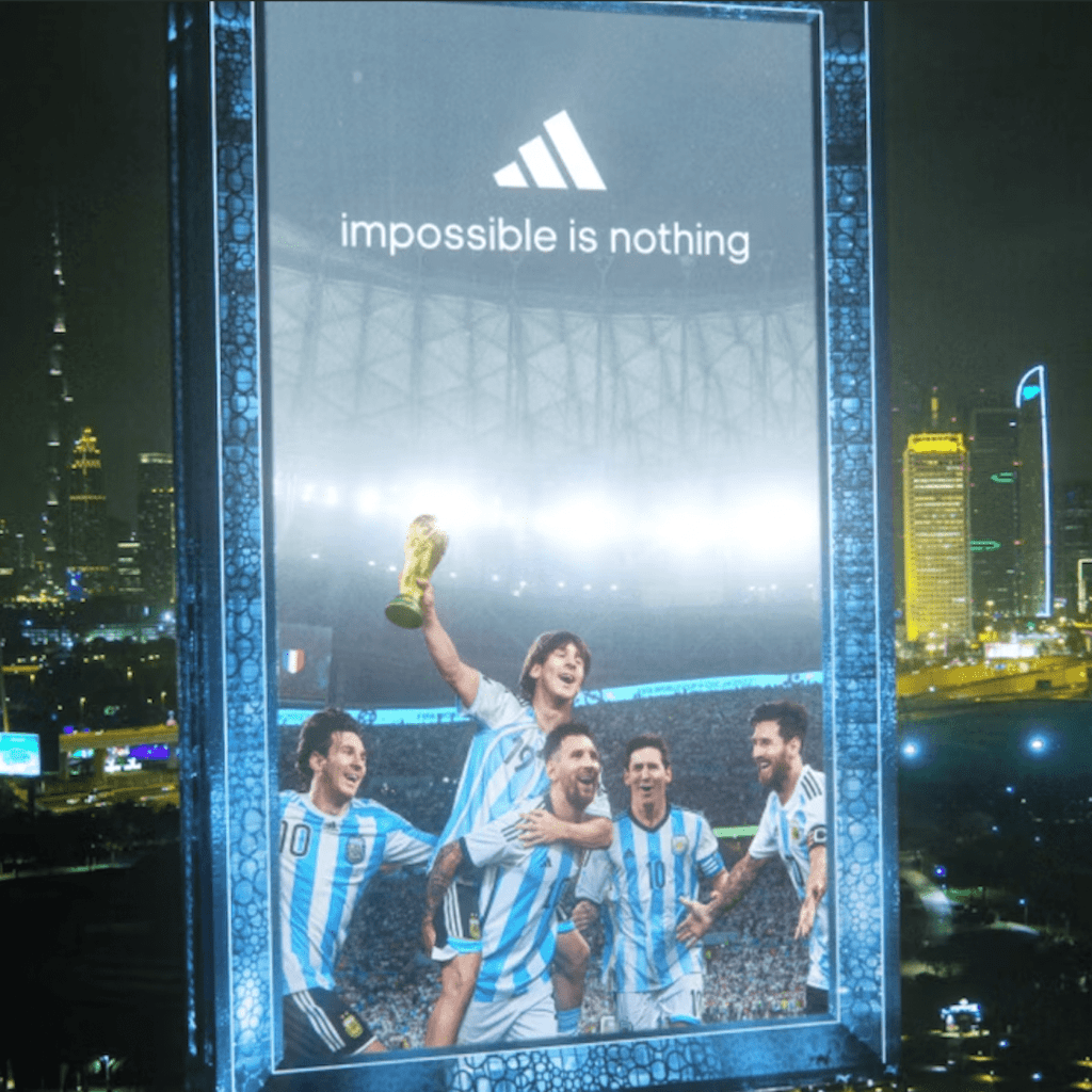 The 3D billboard shows five different images of Lionel Messi early in his career.